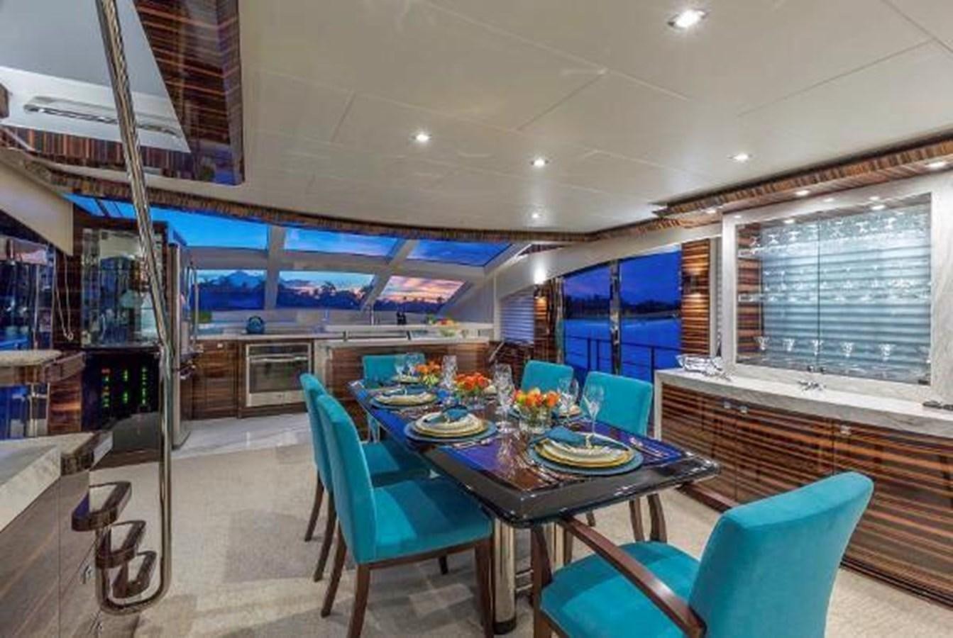 a room with a table and chairs aboard HAMPTON EURO 830 Yacht for Sale