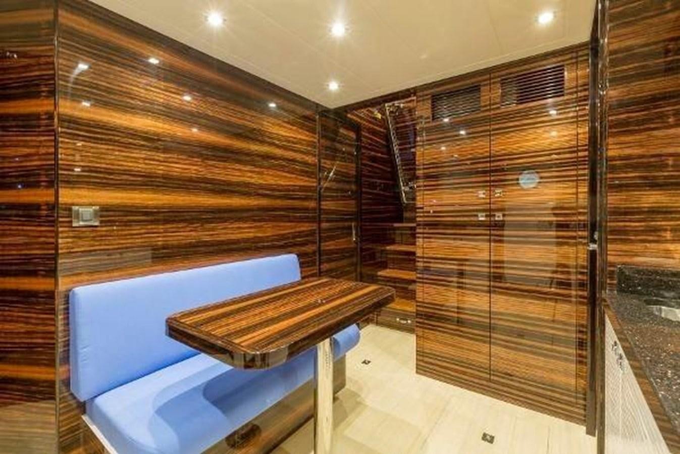 a room with a bench and a table aboard HAMPTON EURO 830 Yacht for Sale