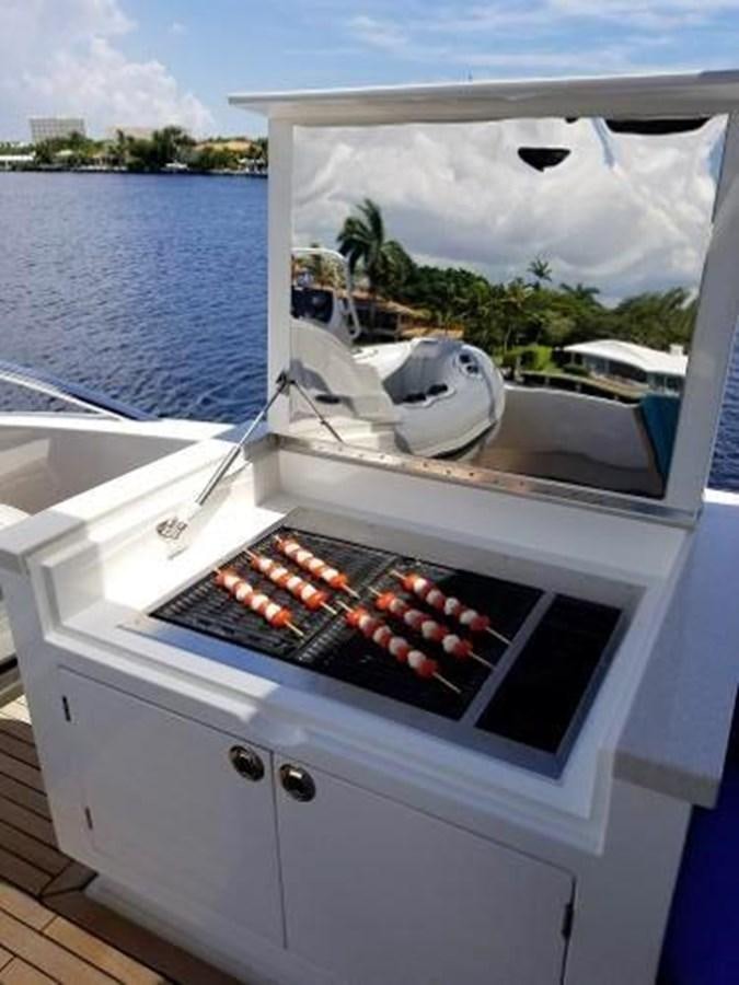 a white boat with red berries on it aboard HAMPTON EURO 830 Yacht for Sale