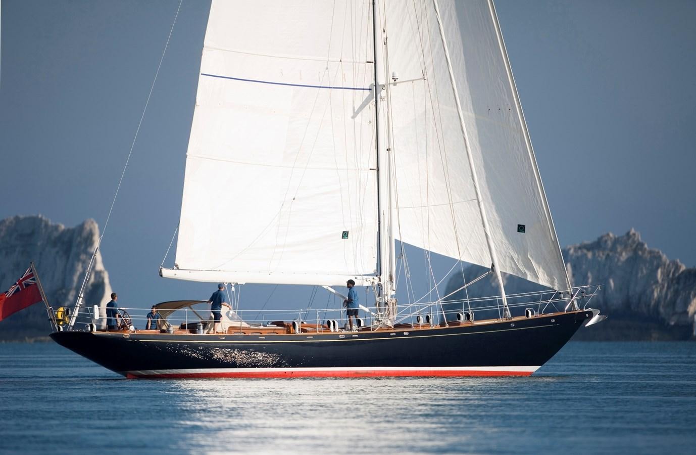 a boat with a sail on the water aboard COPIHUE Yacht for Sale