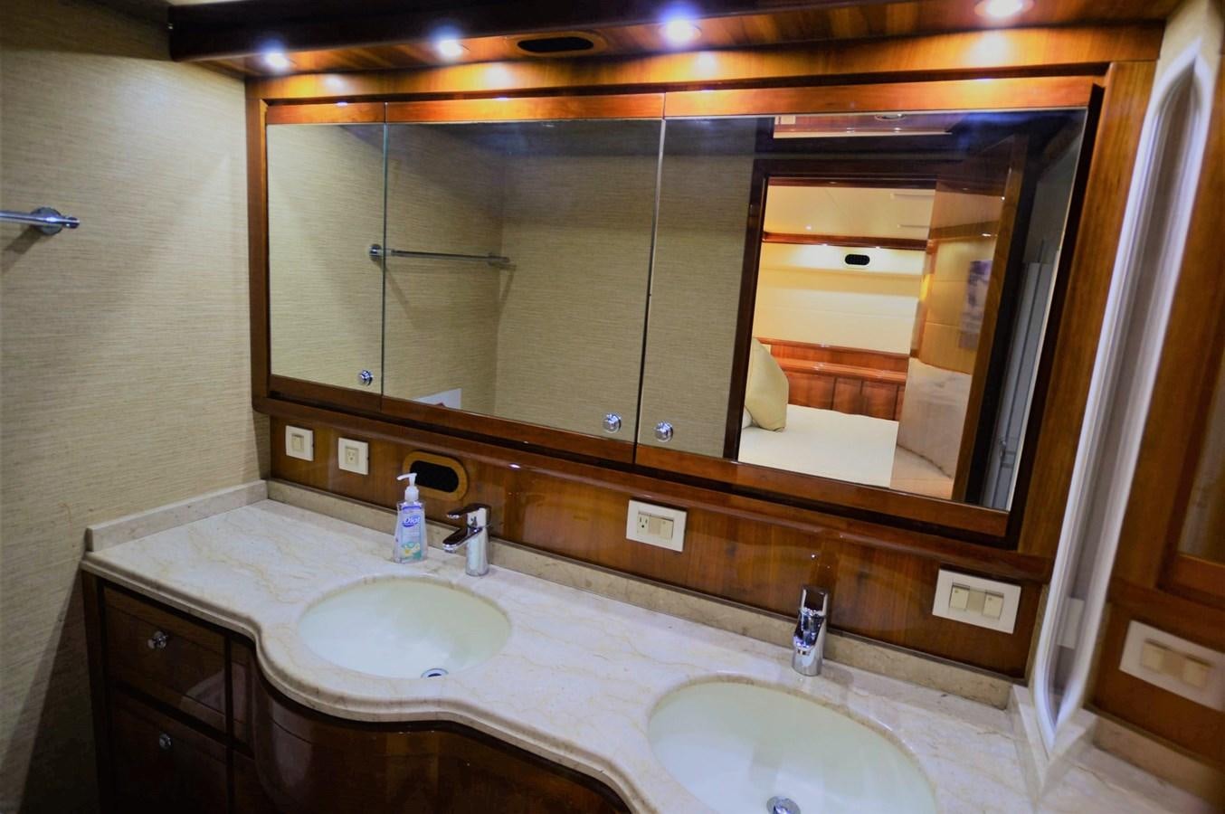 a bathroom with two sinks aboard GABBY MILAN 2 Yacht for Sale
