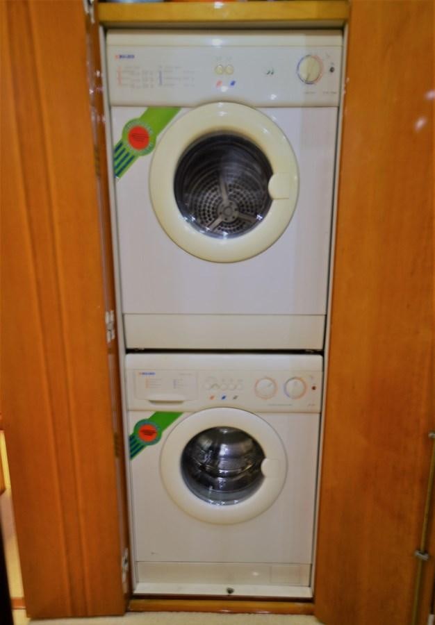 a white washing machine aboard GABBY MILAN 2 Yacht for Sale