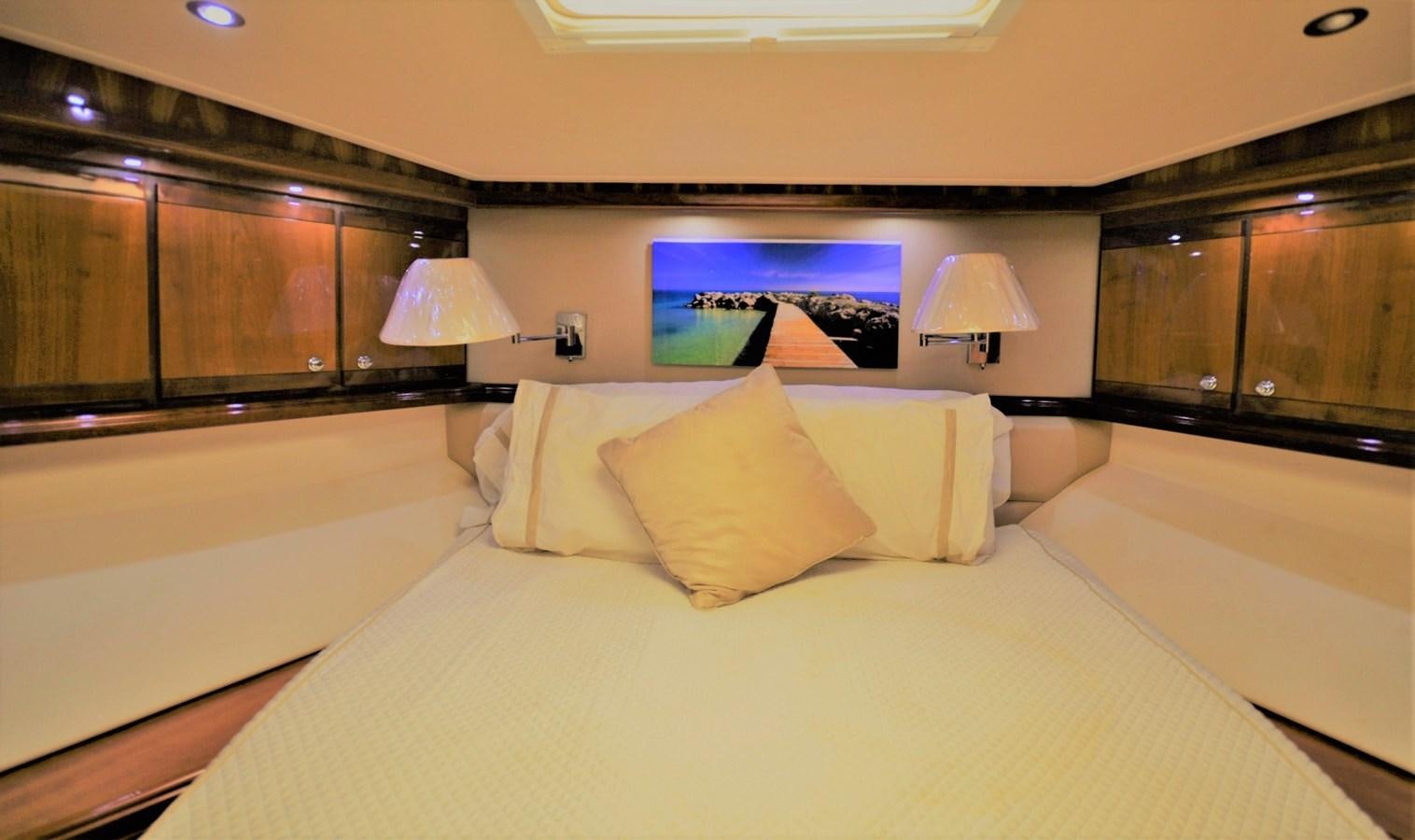 a bed with pillows on it aboard GABBY MILAN 2 Yacht for Sale