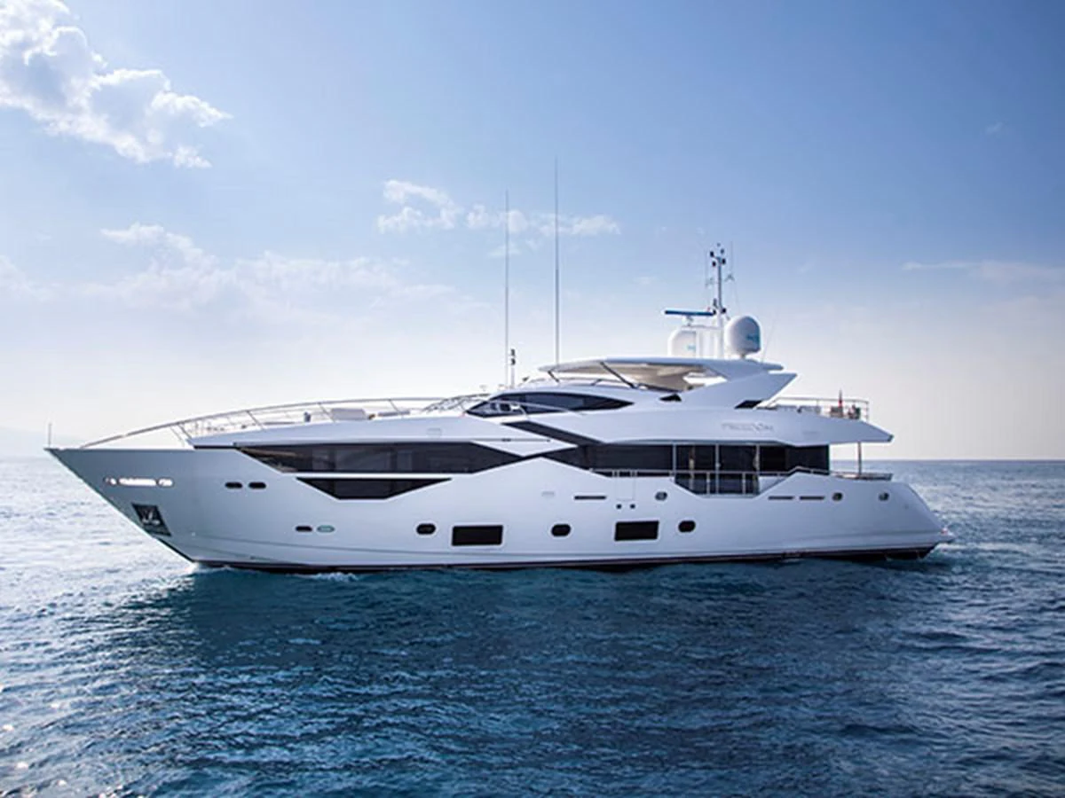 a white yacht in the water aboard FREEDOM Yacht for Sale