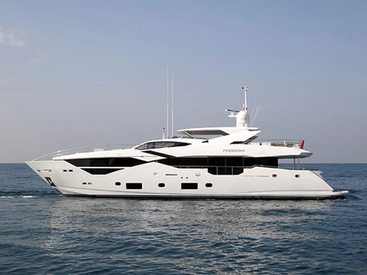 a white yacht in the water aboard FREEDOM Yacht for Sale