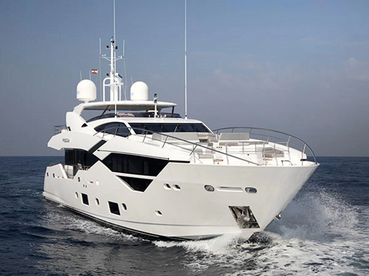 a white yacht on the water aboard FREEDOM Yacht for Sale