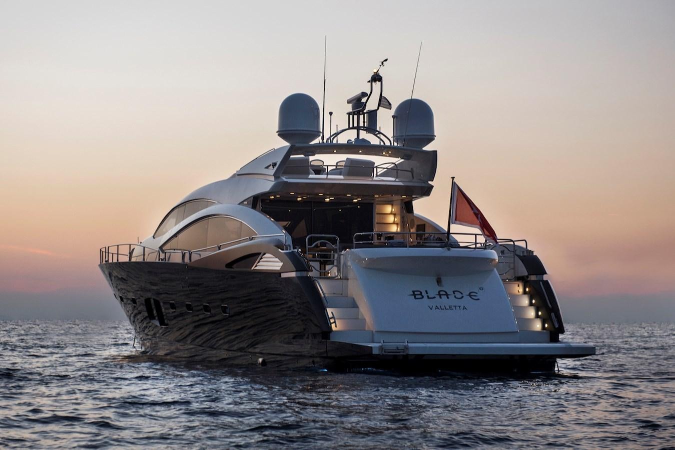 a large ship in the water aboard BLADE 6 Yacht for Sale