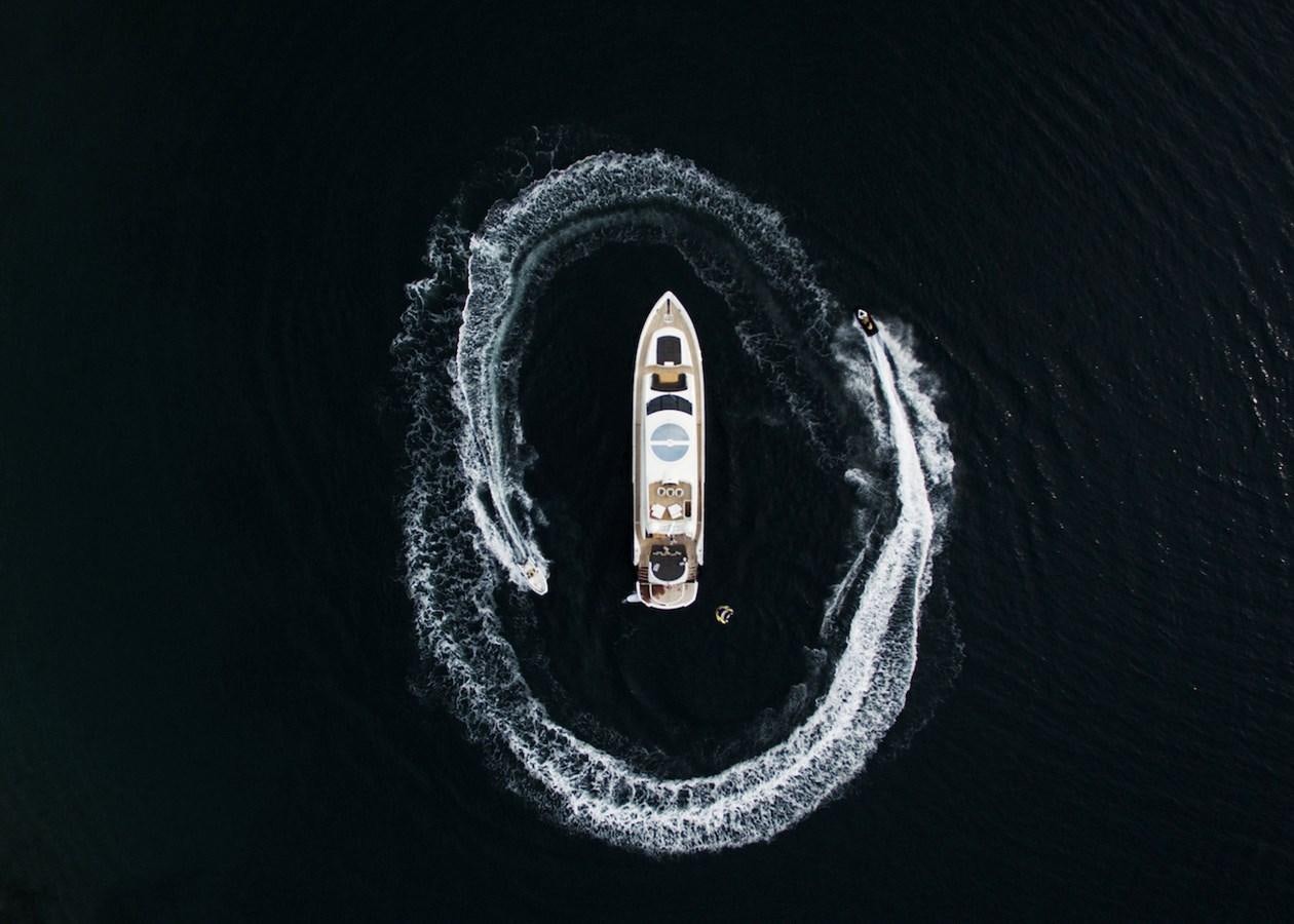 a silver car with a black background aboard BLADE 6 Yacht for Sale