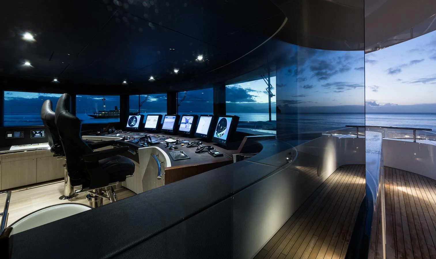 a room with many computer screens aboard LAURENTIA Yacht for Charter