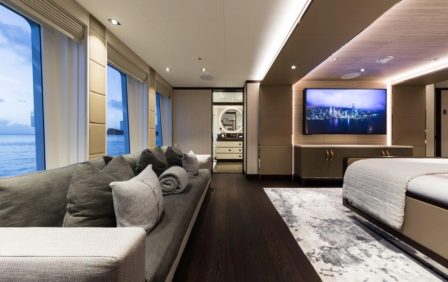 a living room with a large tv aboard LAURENTIA Yacht for Charter