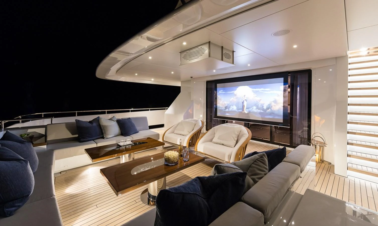 a living room with a large tv aboard LAURENTIA Yacht for Charter
