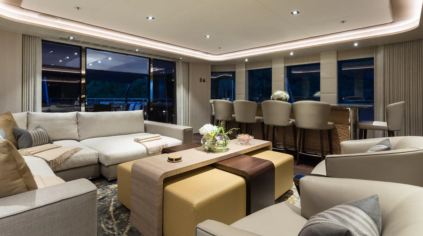 a living room with a large window aboard LAURENTIA Yacht for Charter