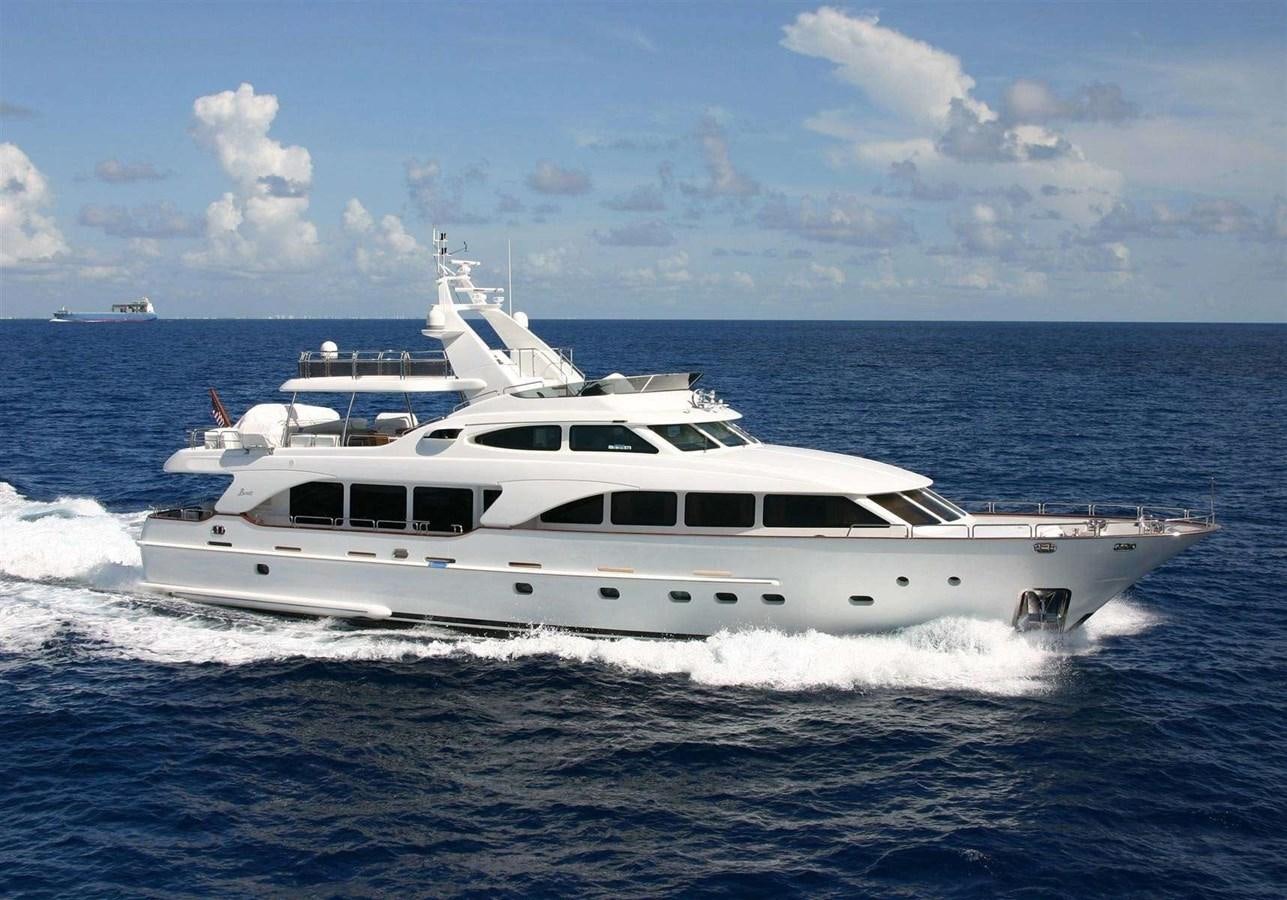 a white yacht on the water aboard ENIGMA Yacht for Sale
