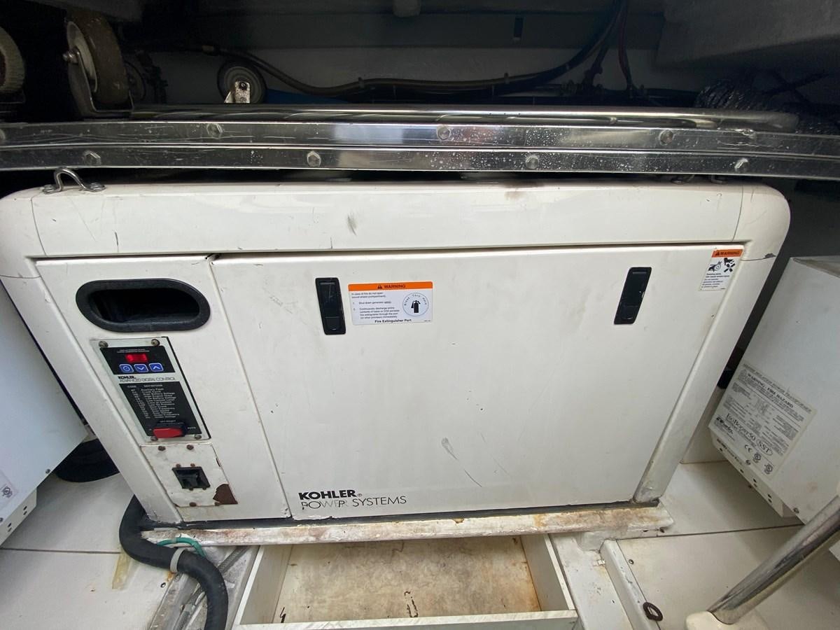 a white rectangular object with a red label on it aboard Miss Penny Yacht for Sale