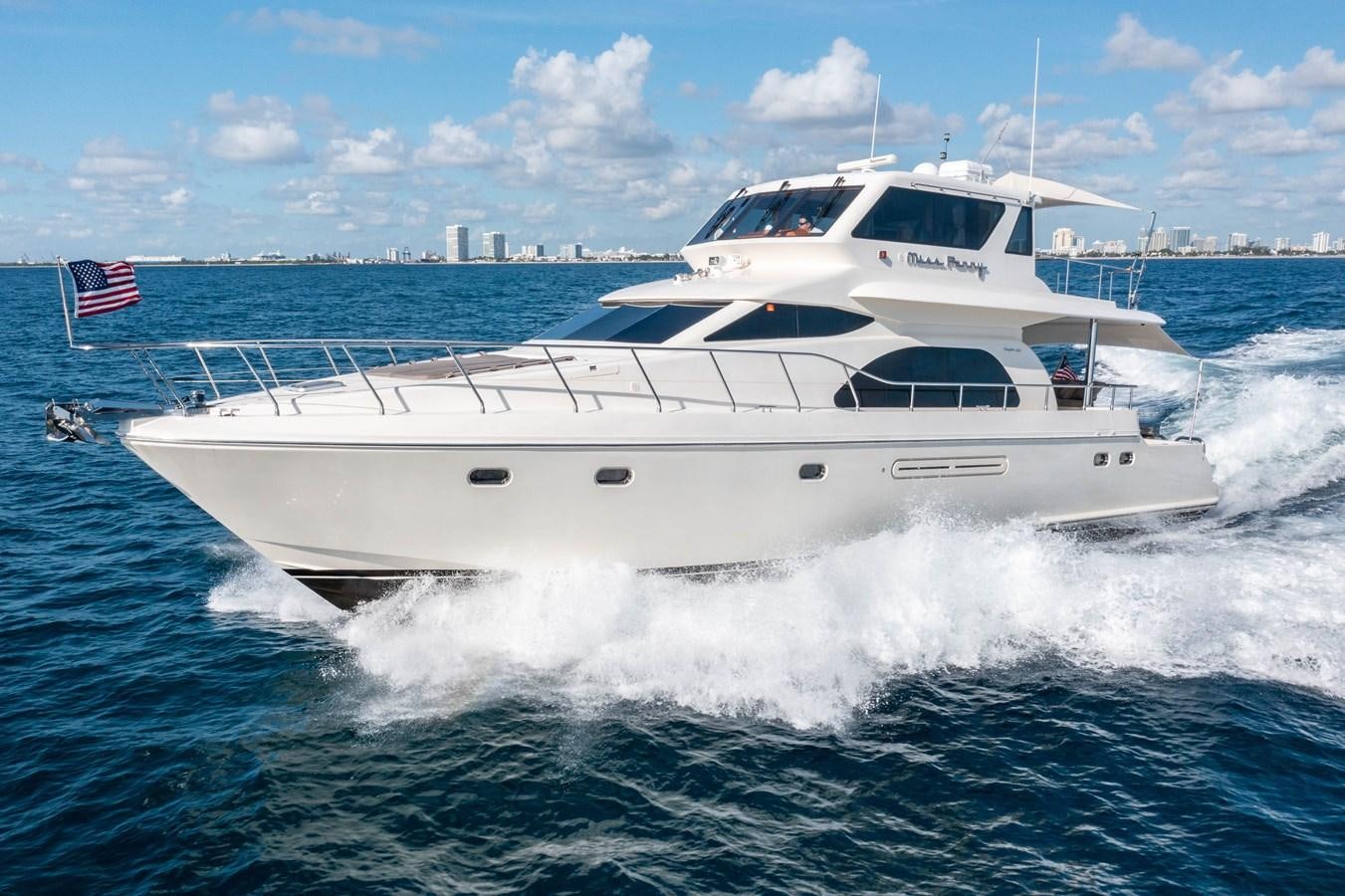 a white yacht on the water aboard Miss Penny Yacht for Sale
