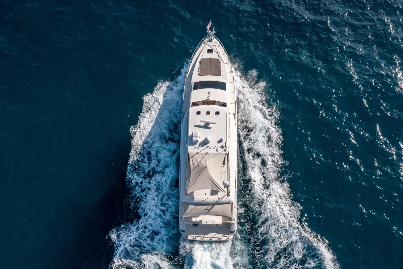 a rocket taking off from the ocean with Chrysler Building in the background aboard Miss Penny Yacht for Sale
