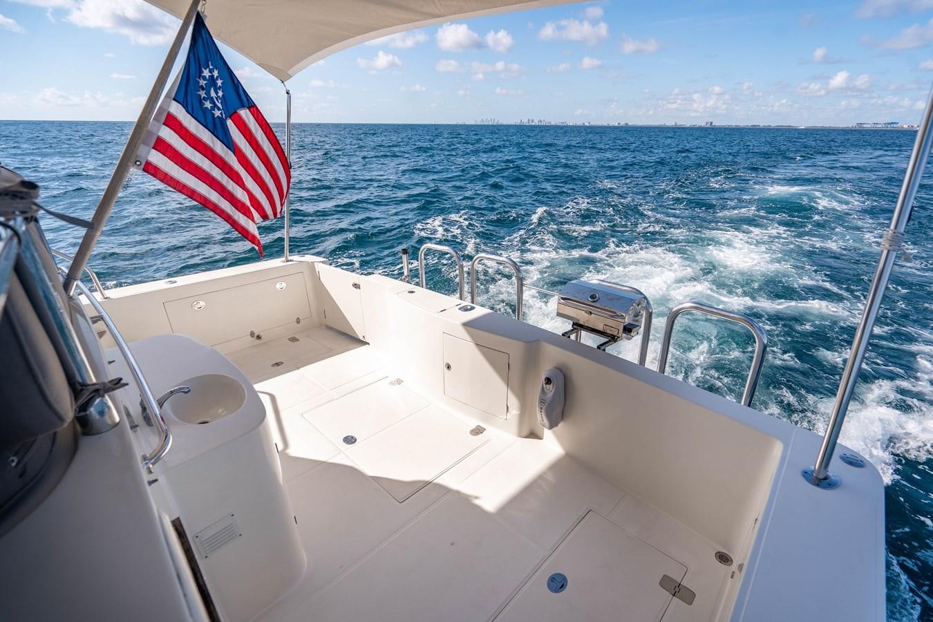 a flag on a boat aboard Miss Penny Yacht for Sale
