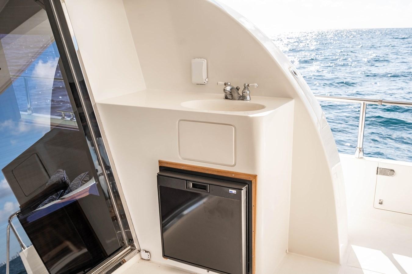 a sink and microwave in a boat aboard Miss Penny Yacht for Sale