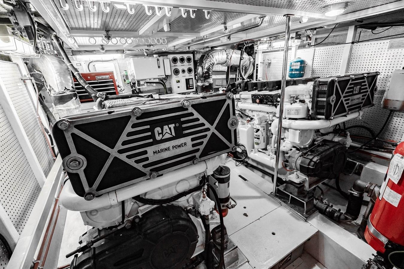 a large machine with a large white object on the side aboard Miss Penny Yacht for Sale