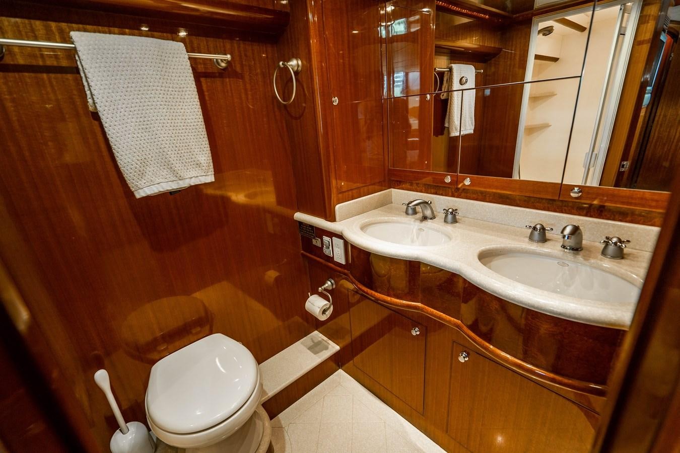 a bathroom with a sink and a toilet aboard Miss Penny Yacht for Sale