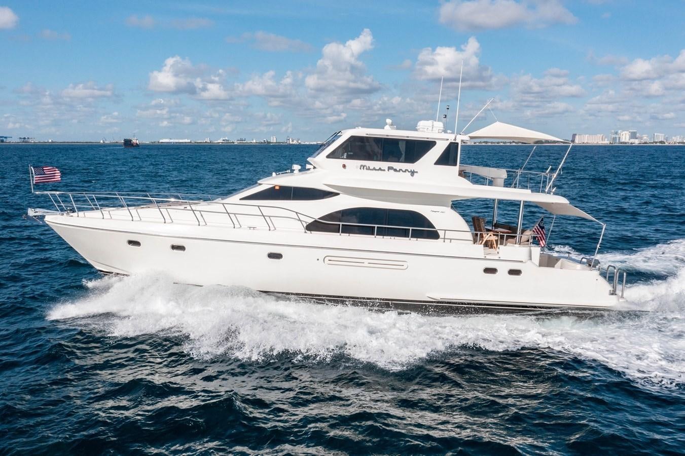 a white yacht on the water aboard Miss Penny Yacht for Sale