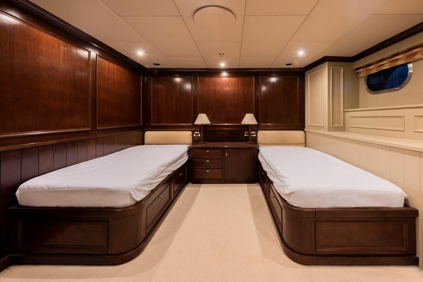 a room with a few beds aboard BIG ARON Yacht for Sale