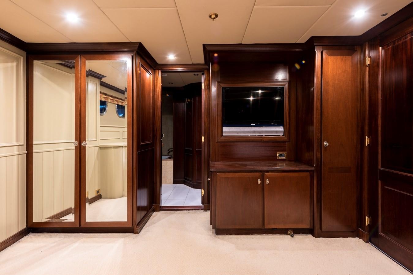 a room with a large mirror and a large closet aboard BIG ARON Yacht for Sale