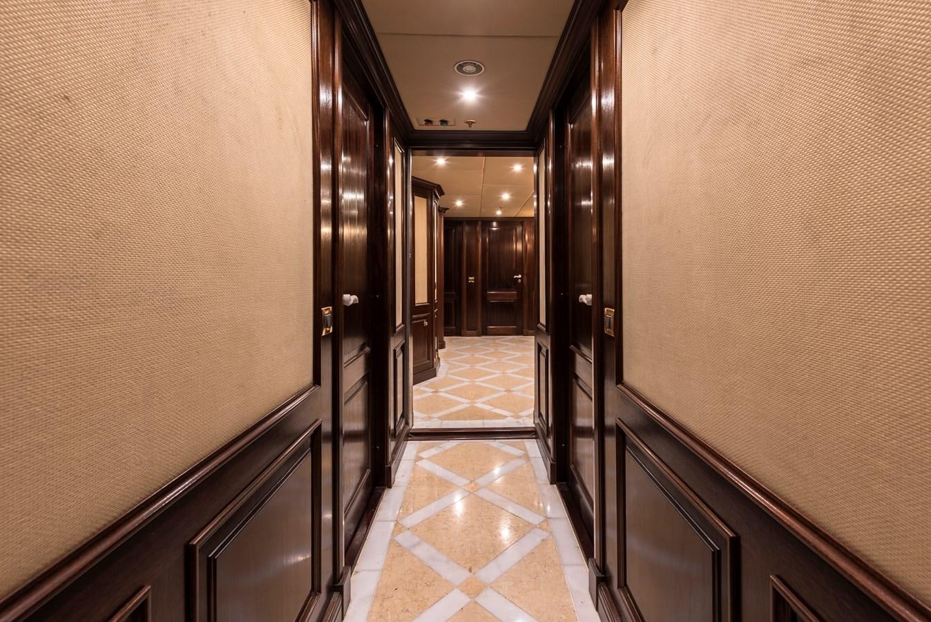 a hallway with doors aboard BIG ARON Yacht for Sale