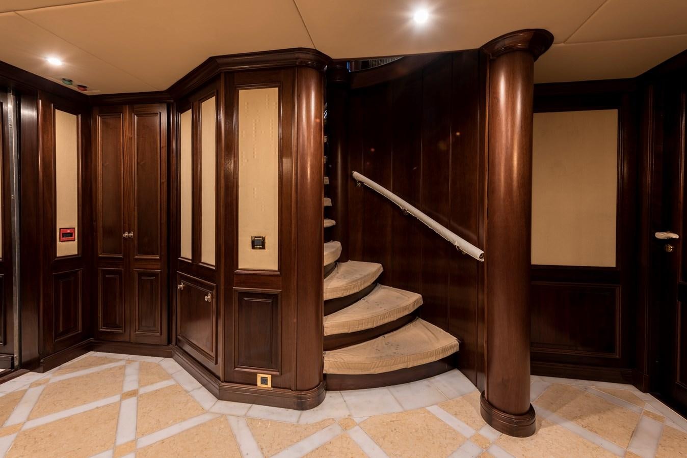 a large wood cabinet in a room aboard BIG ARON Yacht for Sale