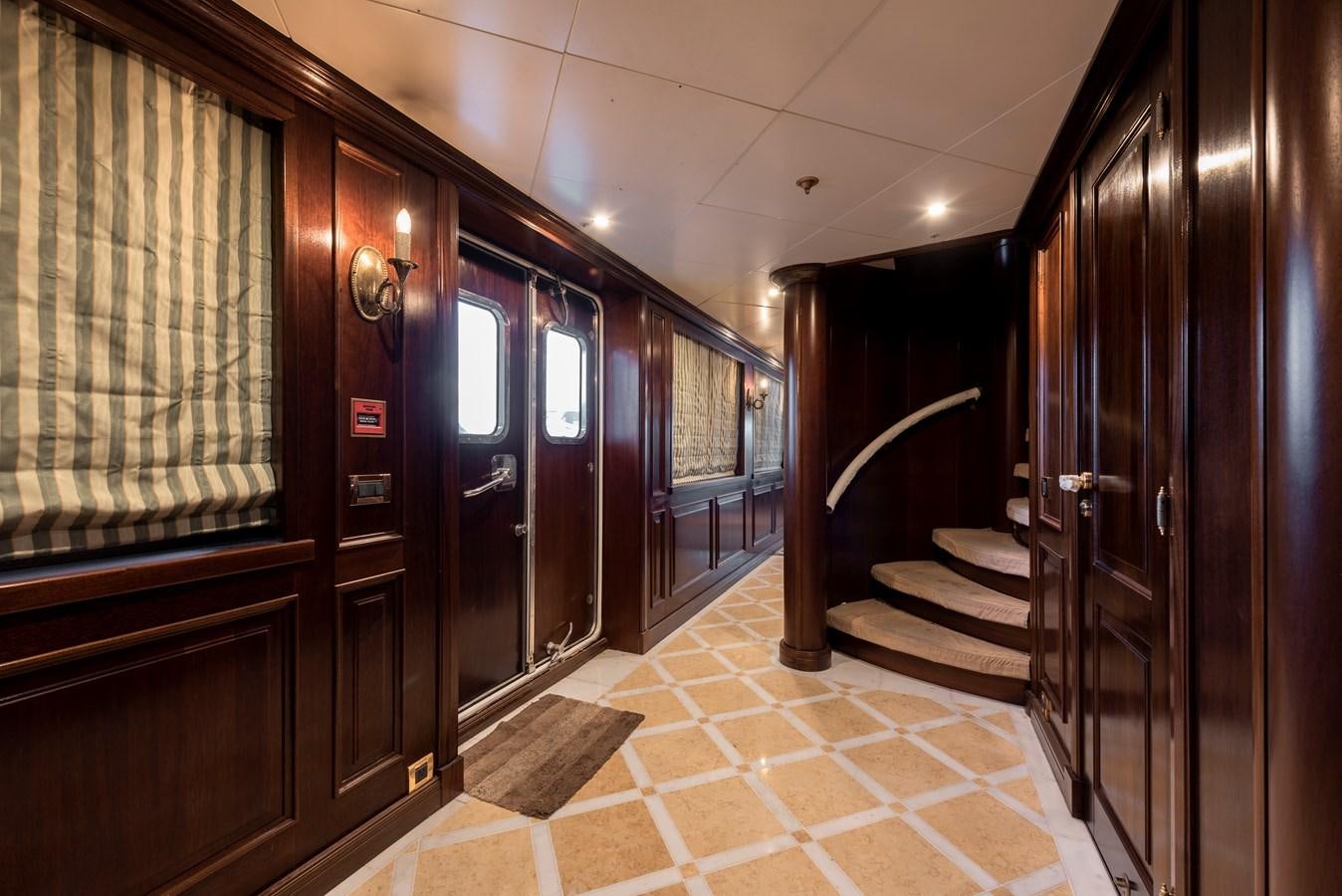 a hallway with doors aboard BIG ARON Yacht for Sale