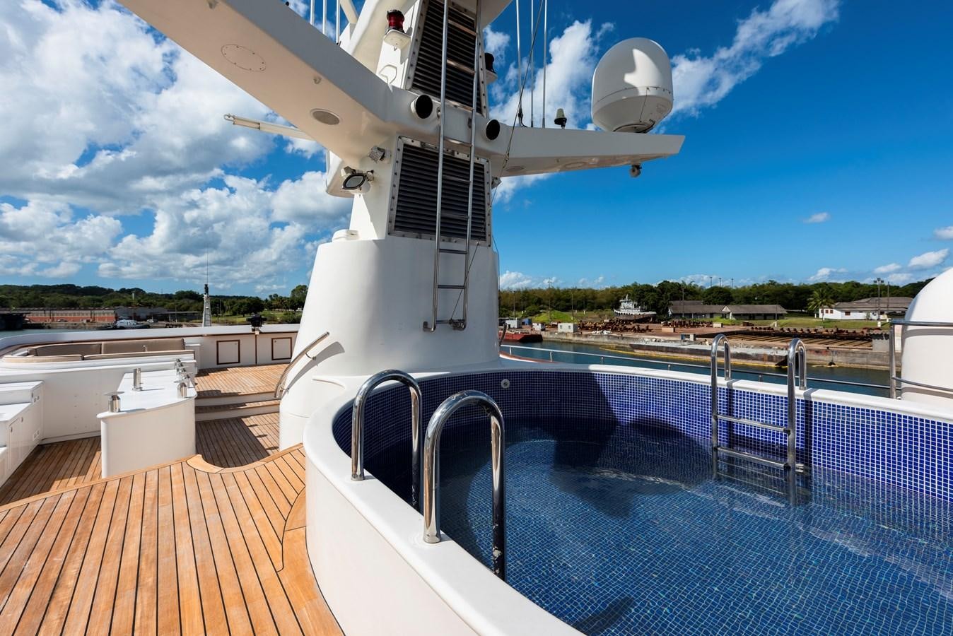 a boat on a deck aboard BIG ARON Yacht for Sale