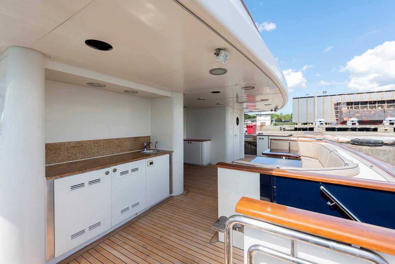 a kitchen with a large island aboard BIG ARON Yacht for Sale