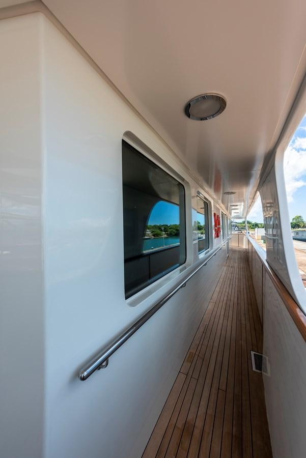 a white wall with a window and a door with a window aboard BIG ARON Yacht for Sale