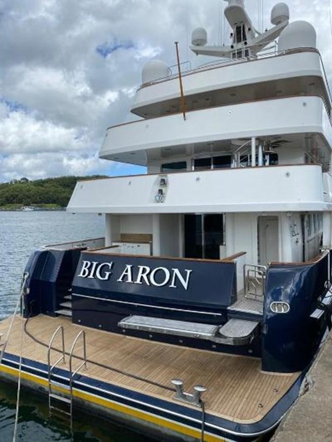 a boat docked at a pier aboard BIG ARON Yacht for Sale