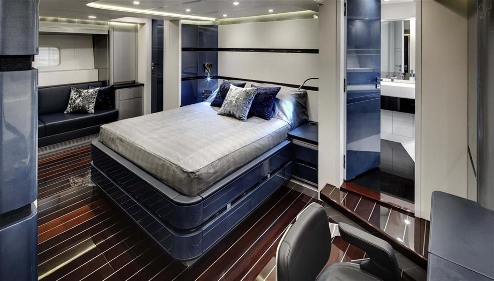 a large bed in a room aboard BLISS Yacht for Charter