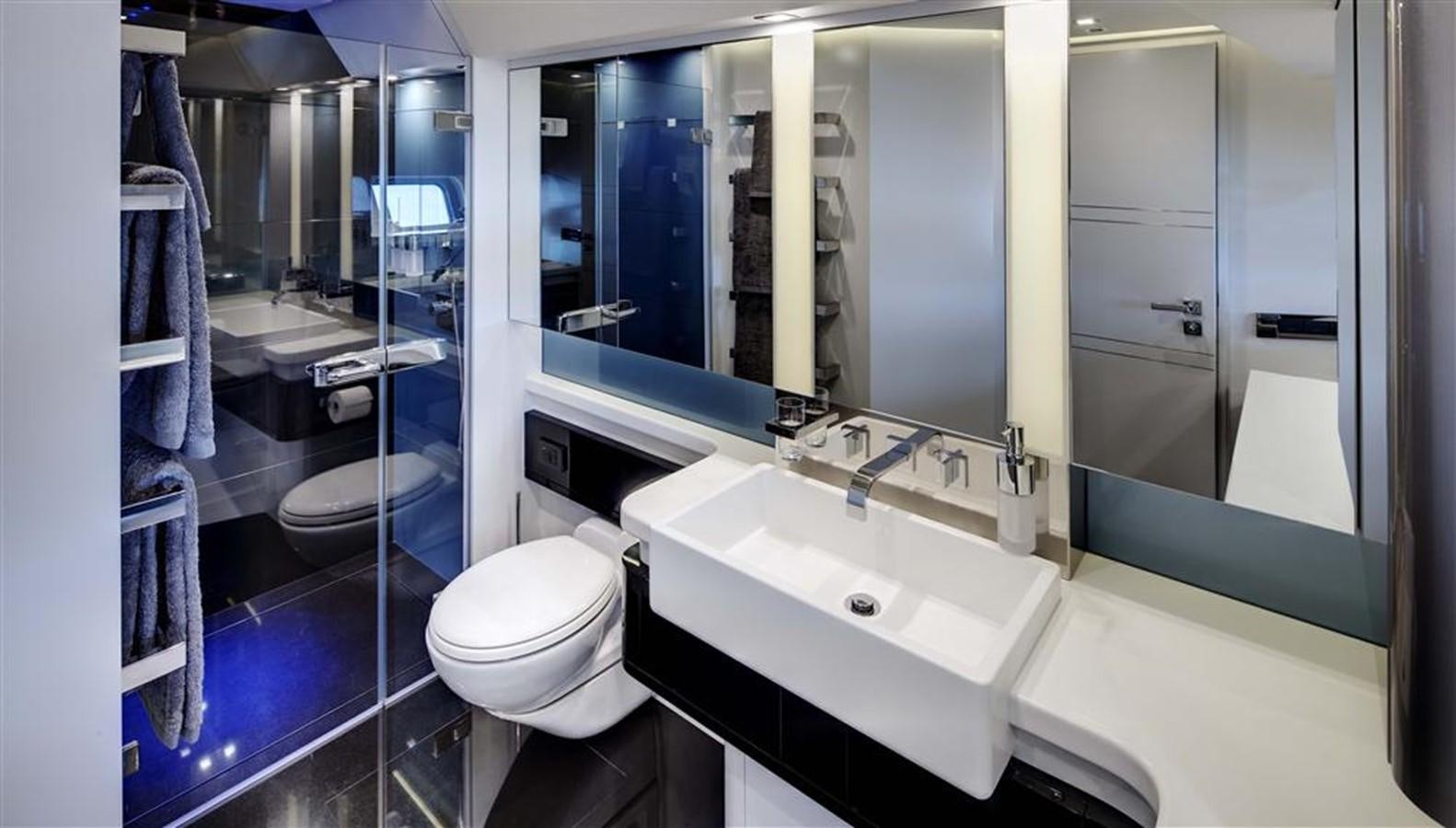 a bathroom with a sink and a mirror aboard BLISS Yacht for Charter