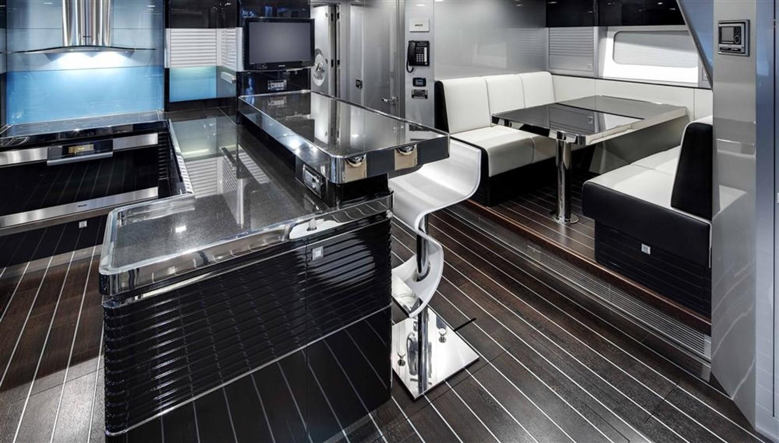a kitchen with a stainless steel sink aboard BLISS Yacht for Charter