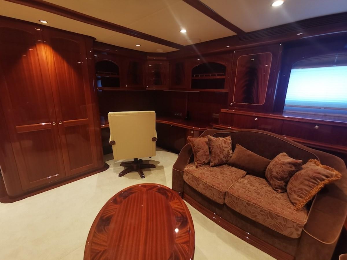 a living room with a couch and a chair aboard ALBINA Yacht for Sale