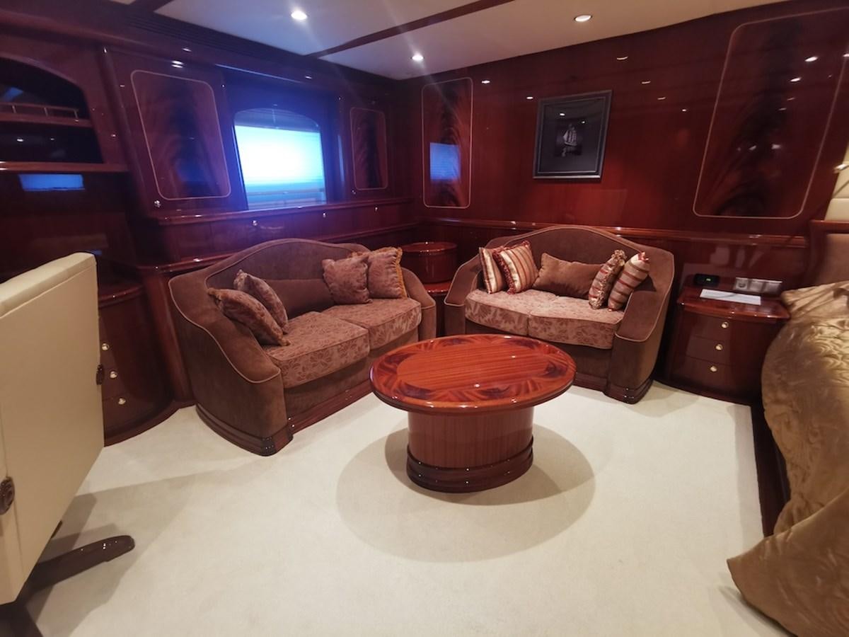 a living room with leather furniture aboard ALBINA Yacht for Sale