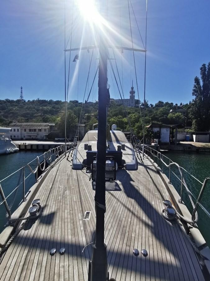 a large ship docked aboard ALBINA Yacht for Sale