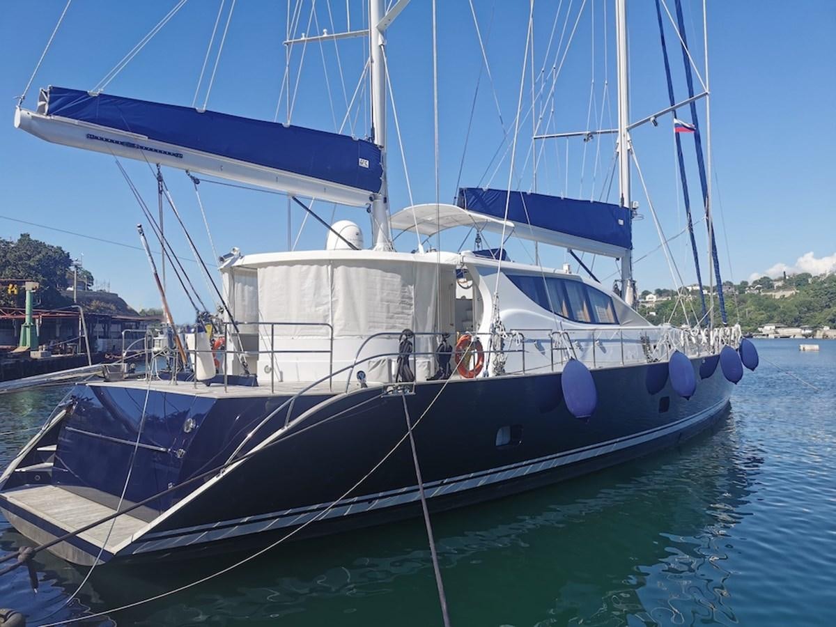 a boat docked at a pier aboard ALBINA Yacht for Sale