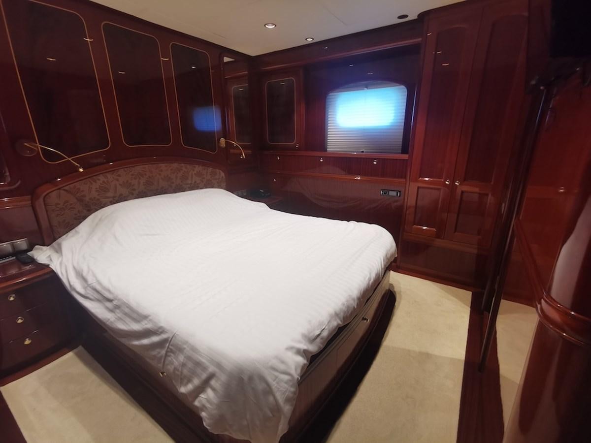 a bed in a room aboard ALBINA Yacht for Sale