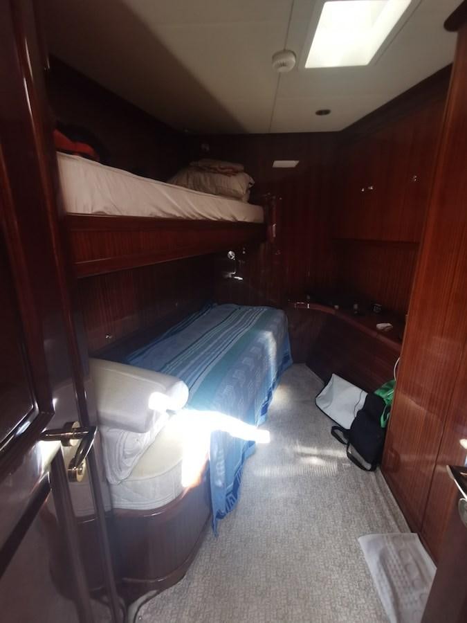 a room with bunk beds aboard ALBINA Yacht for Sale
