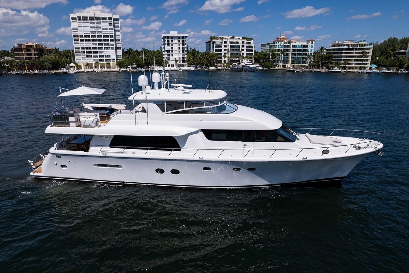 a white yacht in the water aboard ROBINSON CRUSOE Yacht for Sale