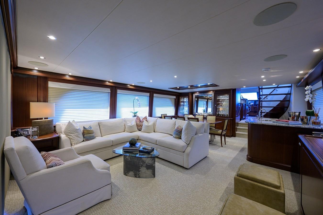 a living room with a couch and a table aboard ROBINSON CRUSOE Yacht for Sale