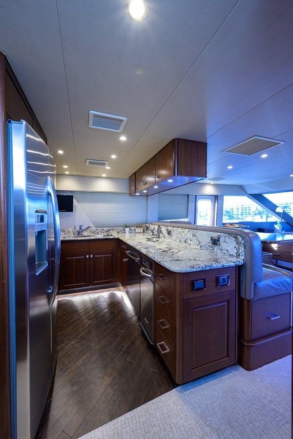 a kitchen with a large island aboard ROBINSON CRUSOE Yacht for Sale