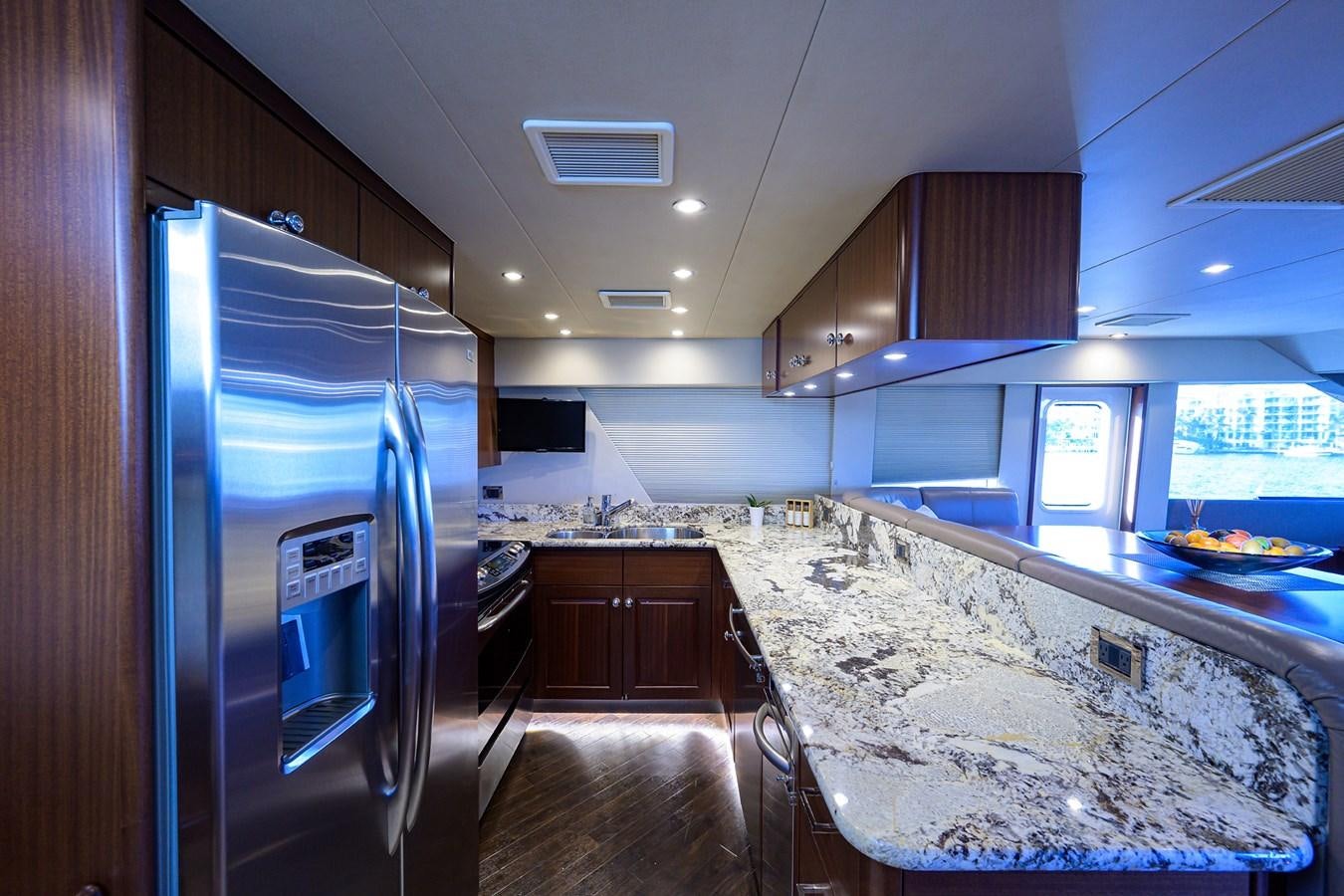a kitchen with a large marble counter top aboard ROBINSON CRUSOE Yacht for Sale