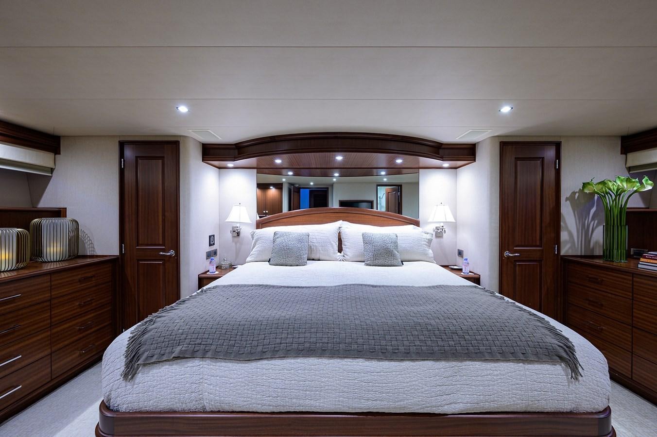 a large bed in a hotel room aboard ROBINSON CRUSOE Yacht for Sale