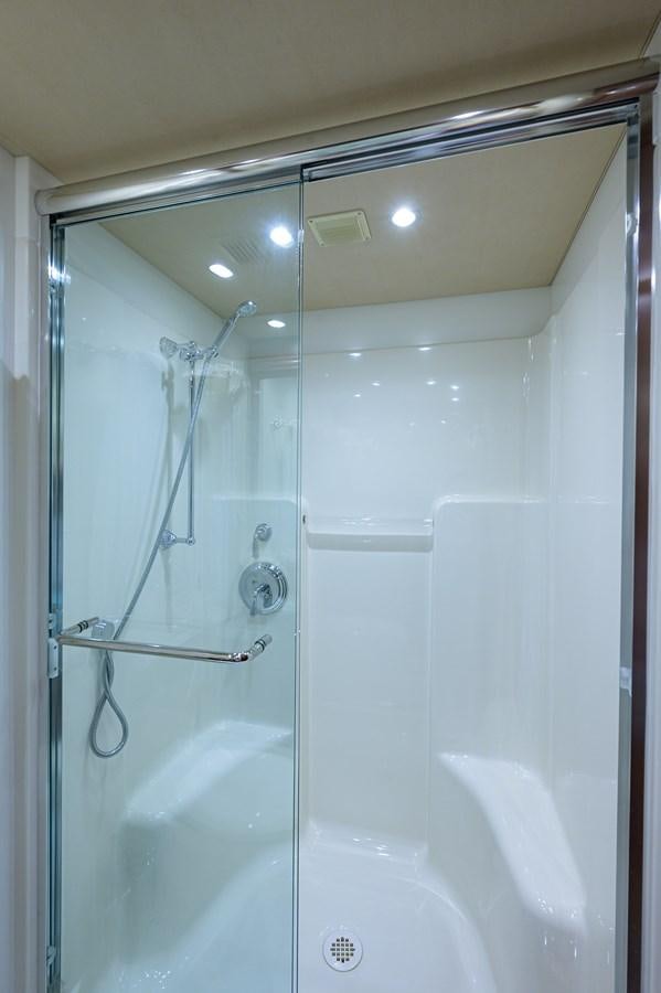 a shower with a glass door aboard ROBINSON CRUSOE Yacht for Sale