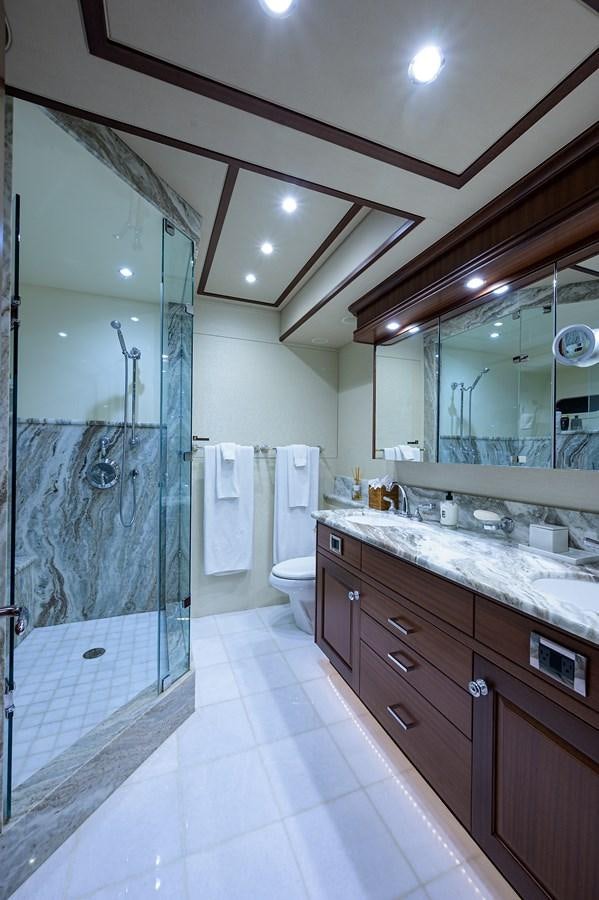 a bathroom with a shower and sink aboard ROBINSON CRUSOE Yacht for Sale